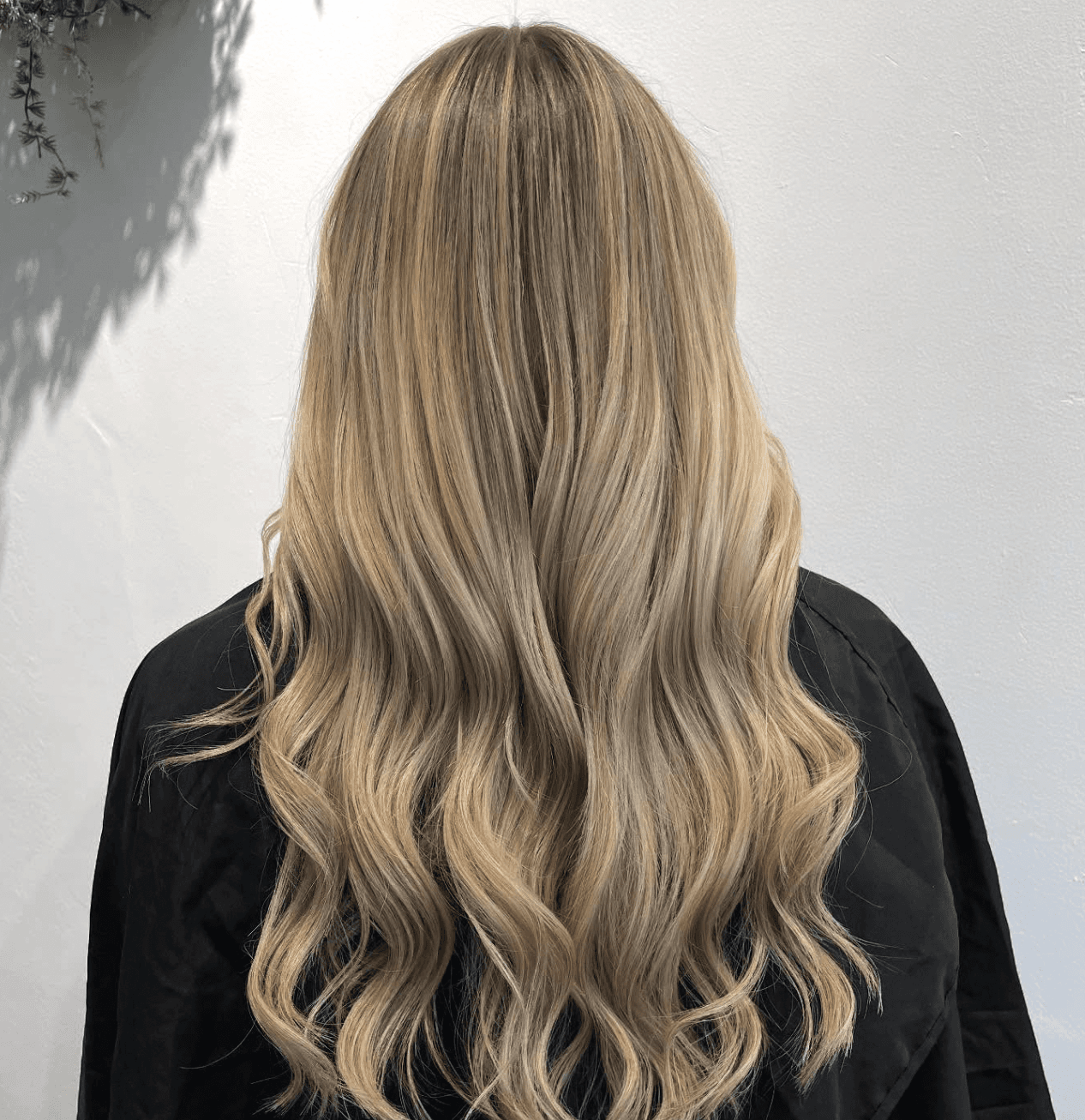 Client looking in mirror